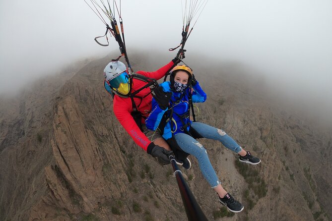 Acrobatic Paragliding Flight with Spanish Champion in Tenerife - Weather, cancellations, and practical planning