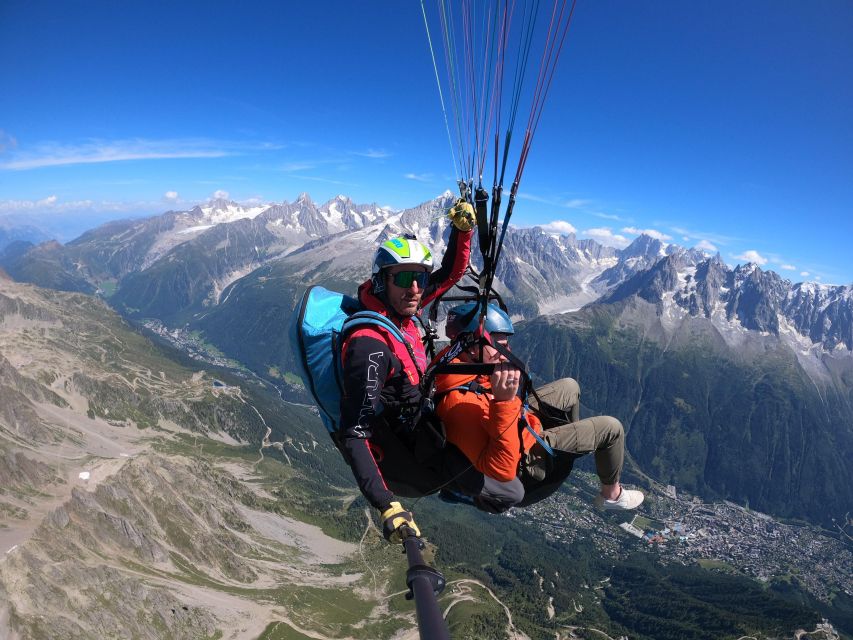 Chamonix: Tandem Paragliding Flight with Video - Preparing on the grassy launch slope