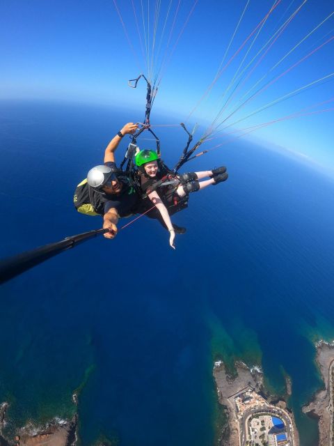 Costa Adeje: Tandem Paragliding Flight with Pickup - Landing near the beach