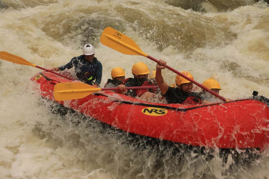 From Medellín: Paragliding and Rafting Combo Tour - Three hours on the Class IV Calderas River
