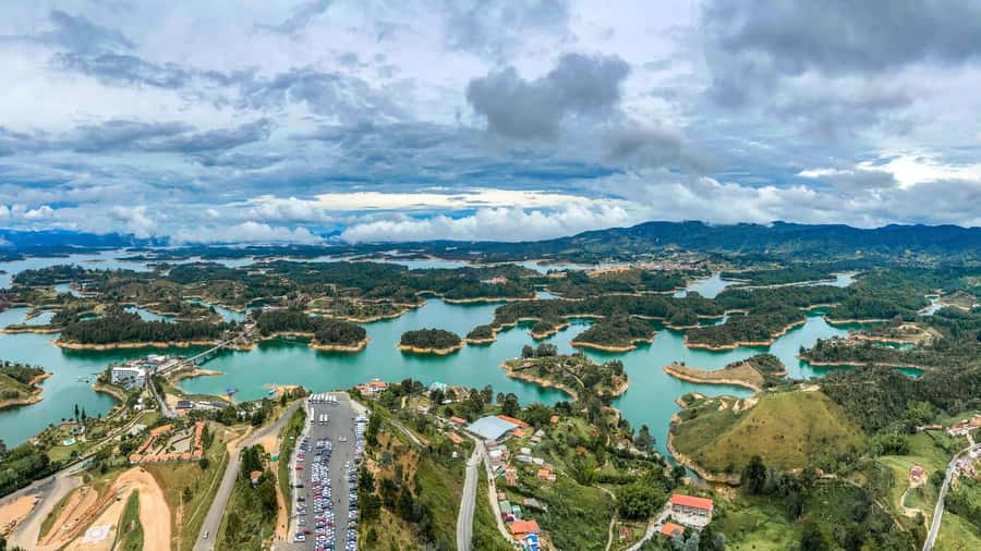 From Medellín: Paragliding Flight and Guatape Tour - Climbing the Stone of Guatapé