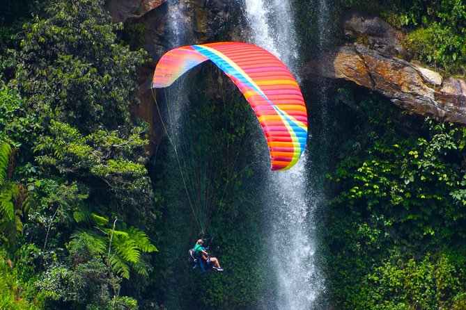 Fun RAFTING + Awesome PARAGLIDING over giant waterfalls from MEDELLIN - From Medellín to Cocorná by private car
