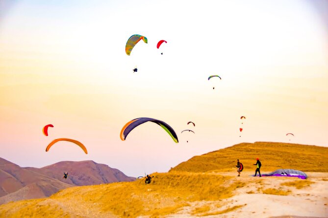 Half-Day Paragliding in Marrakech and Atlas Mountains - Transport, Group Size, and the Return to Marrakech