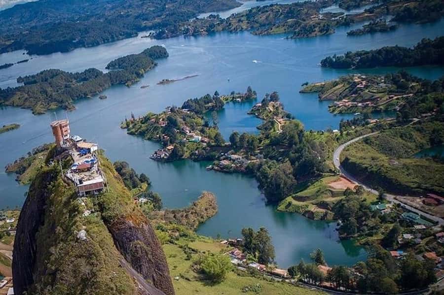Medellín: Private Tour to Guatapé + Paragliding - Climbing the 740 stairs of El Peñol Rock