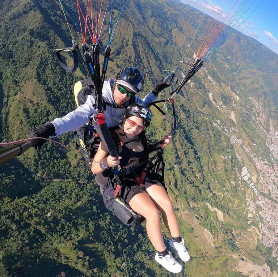 Medellín: Private Tour to Guatapé + Paragliding - Walking through colorful Guatapé
