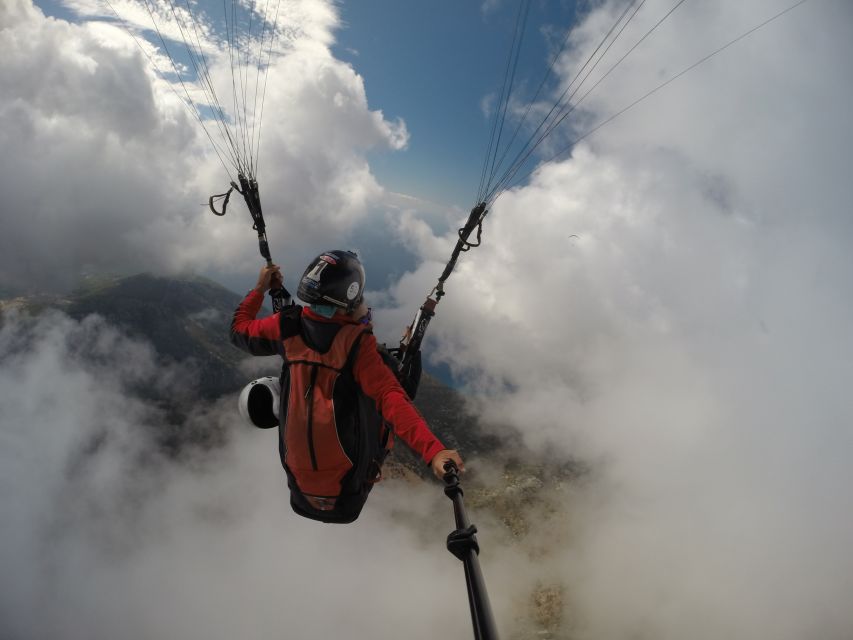 Oludeniz: Tandem 30-Minute Paragliding Flight - Landing and the return to Ölüdeniz