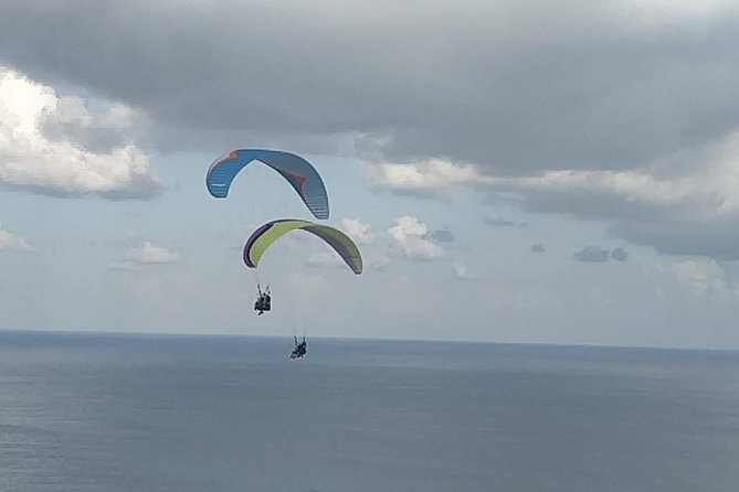 Paragliding Bali at Uluwatu Cliff with Photos/Videos - Who will enjoy this most?