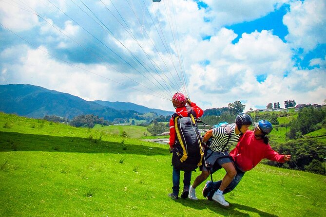 Paragliding flight in Medellin with expert pilots - Taking off from the hills above Medellín