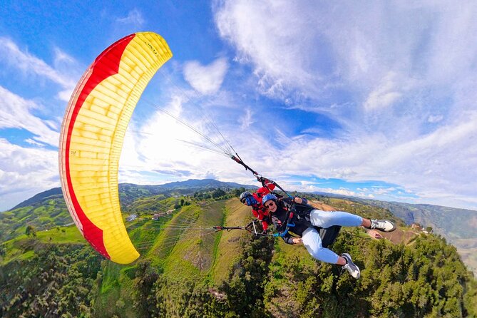 Paragliding flight in Medellin with expert pilots - Weather is part of the experience