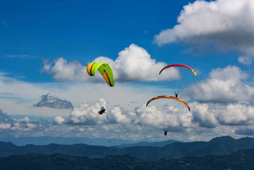 Pokhara Paragliding - Landing near Lakeside and collecting your flight media
