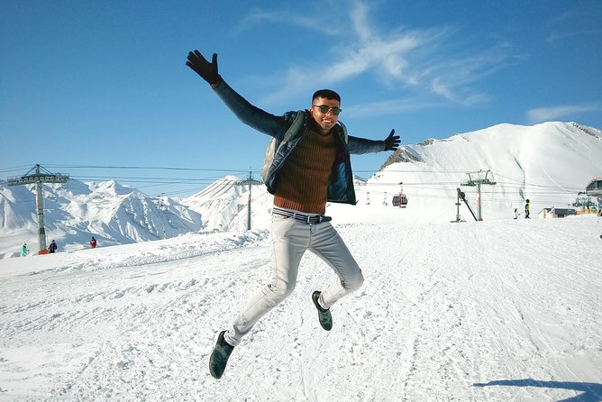 Private Full Day Tour In Kazbegi - Gudauri (Paragliding & Rafting) - Stepantsminda and the view from Rooms Hotel