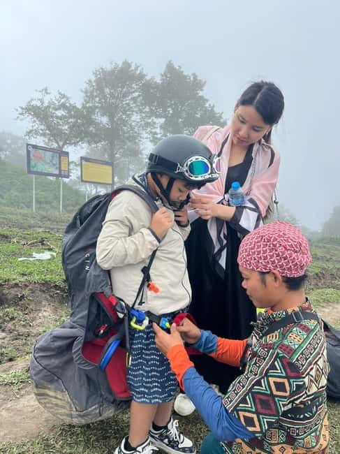 Sapa: Tandem Paragliding Adventure with Pickup & Drop-off - Landing, photos, and the GoPro clip