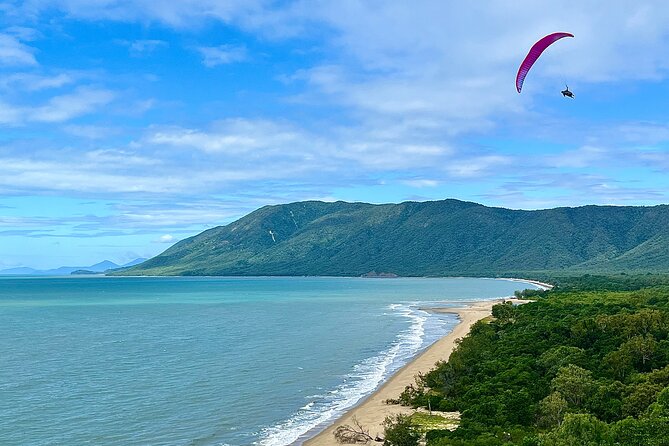 Tandem Paragliding Cairns - Landing softly back on the beach