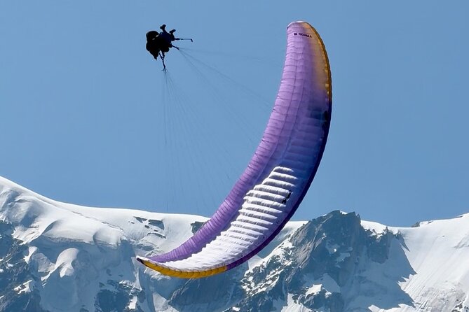 Tandem Paragliding Flight to Chamonix Facing Mont Blanc - Taking off above Chamonix