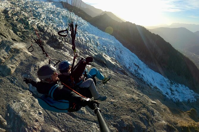 Tandem Paragliding Flight to Chamonix Facing Mont Blanc - Glacier des Bossons and the valley below