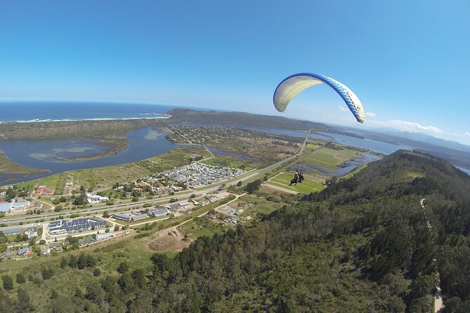 Tandem Paragliding Instructional Flights in Garden Route - Sea, lake, beach, and mountain views