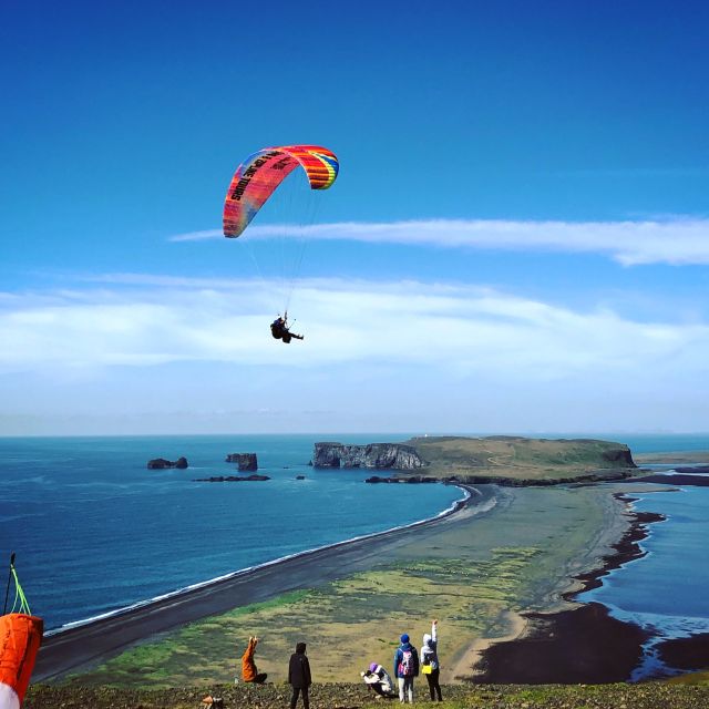 Vík: Paragliding Tandem Flight - Flying above Vík, with the South Coast spread below